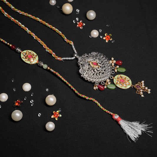 Oxidized Pendant Lumba with matching meena rakhi